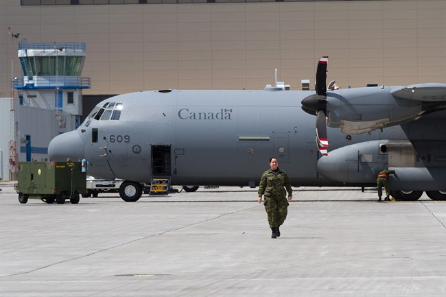 Several CC-130J Hercules transport aircraft sit on the tarmac at CFB Trenton in Trenton, Ont., on Wednesday, May 4, 2016. Russia is conducting a s