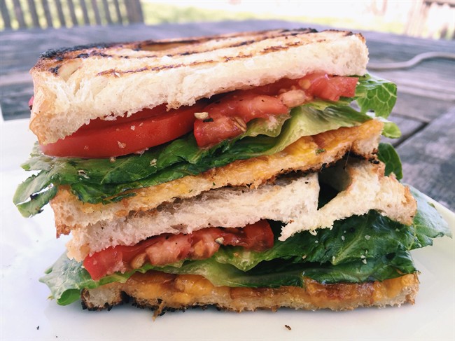 This April 17, 2016 photo shows two favorite sandwiches, the BLT and the grilled cheese, coming together as one, in New Milford, Conn. 