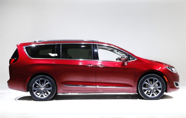 his Friday, Jan. 8, 2016, file photo, shows the 2017 Chrysler Pacifica, in Auburn Hills, Mich. Fiat Chrysler and Google announced Tuesday, May 3, 2016, that they will work together to more than double the size of Google's self-driving vehicle fleet by adding 100 Chrysler Pacifica minivans.