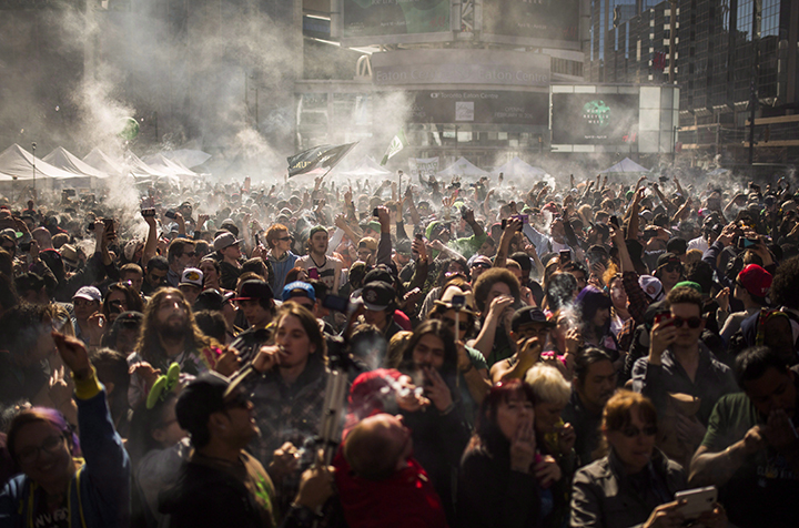 Thousands of people gather to smoke marijuana during the “420 Toronto” rally in Toronto, Wednesday April 20, 2016.