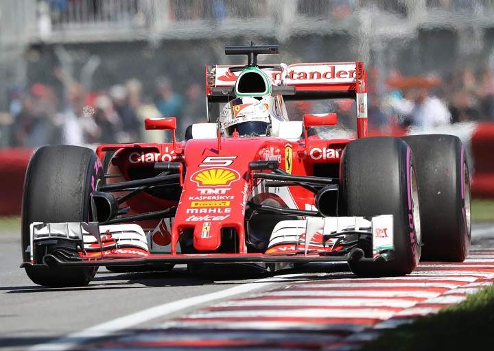Ferrari driver Sebastian Vettel (5) of Germany drives during the second practice session at the Canadian Grand Prix Friday, June 10, 2016 in Montreal.THE CANADIAN PRESS/Tom Boland