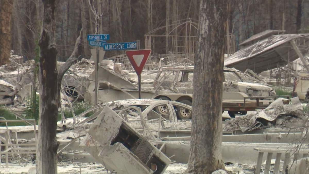 Street signs still stand in a Fort McMurray neighbourhood devastated by wildfire.