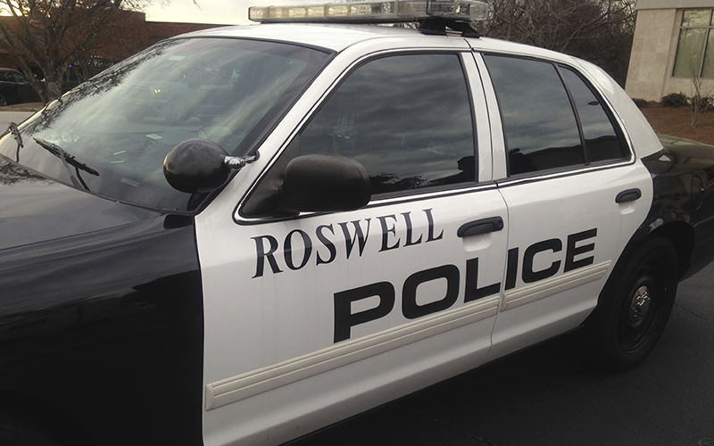 A Roswell, Georgia police officer was shot at early Friday, just hours after five officers were shot and killed in Texas.