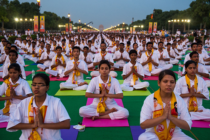 Indian yoga practitioners participate in a rehearsal for International Yoga Day on Rajpath in New Delhi on June 19, 2016.