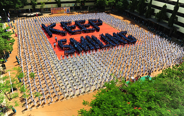 Schoolchildren participate in a yoga session at a school in Chennai, India on June 20, 2016, on the eve of International Yoga Day.