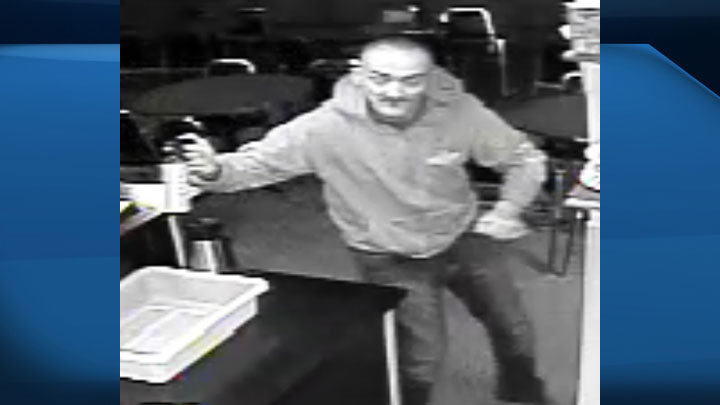 RCMP are looking for a suspect who fled in a vehicle with Saskatchewan licence plates after an armed robbery in Kitscoty, Alta. on Tuesday afternoon.
