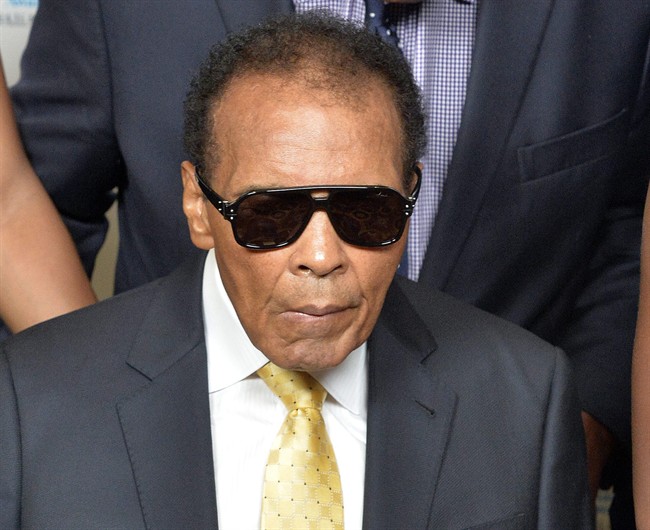  In this Sept. 27, 2014, file photo, Muhammad Ali is shown before the Ali Humanitarian Awards ceremony in Louisville, Ky.