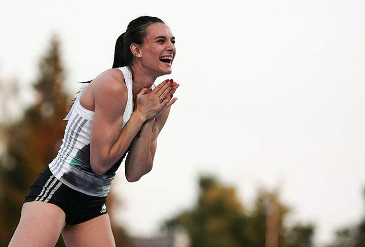 Russia's pole vaulter Yelena Isinbayeva reacts after her jump at the National track and field championships at a stadium in Cheboksary, Russia, Monday, June 20, 2016. 