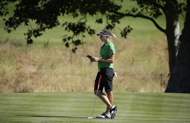 Alena Sharp, of Canada, looks over the first green during the third round of the U.S. Women\’s Open golf tournament at CordeValle Saturday, July 9, 2016, in San Martin, Calif.