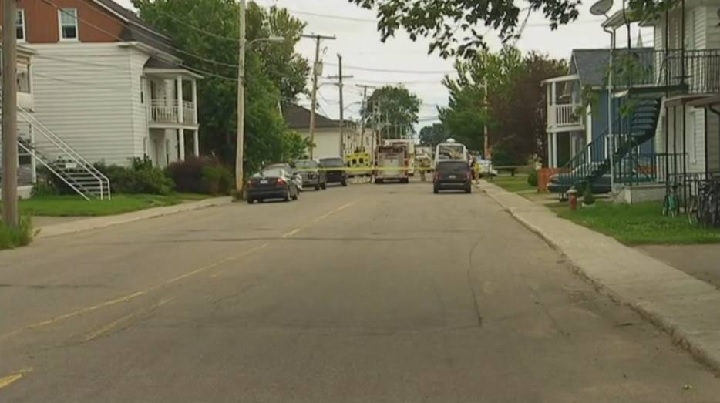 Police are at the scene of a tense standoff on St-Germain Street in Jonquière, Quebec on Saturday, July 9, 2016.