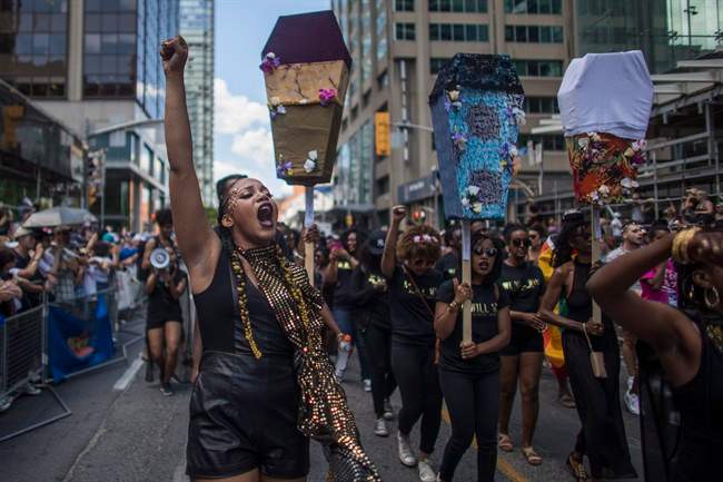 People from Black Lives Matter lead the annual Pride Parade, in Toronto on Sunday, July 3, 2016. 