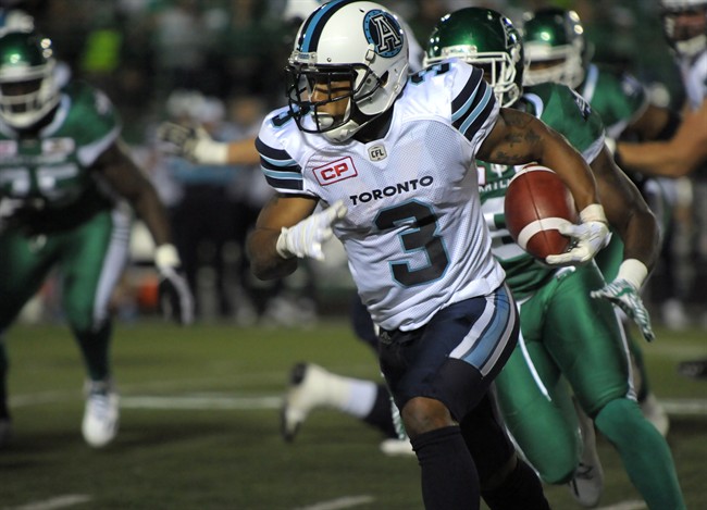 Toronto Argonauts running back Brandon Whitaker runs the ball during CFL action against the Saskatchewan Roughriders, in Regina on Thursday, June 30, 2016. 