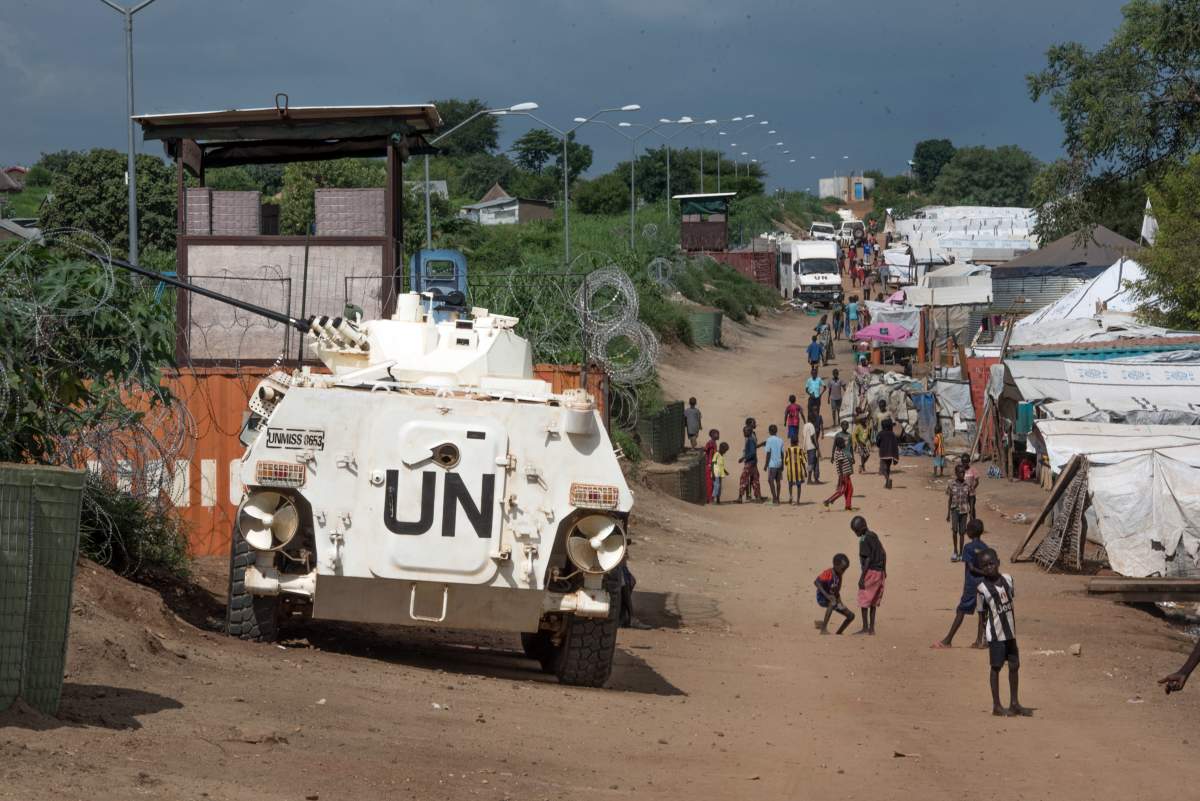 In this file photo taken Monday, July 25, 2016, A UN armoured personnel vehicle stand in a refugee camp in Juba South Sudan. South Sudan on Wednesday, Aug. 10, 2016, rejected a U.S. proposal for the U.N. Security Council to send 4,000 additional troops to the East African country to restore calm, saying it “seriously undermines” its sovereignty and threatens a return to colonialism.