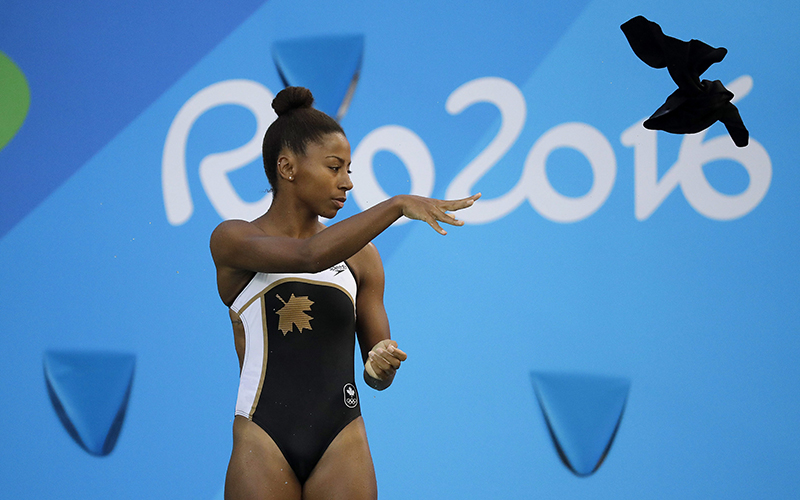 Canada’s Jennifer Abel throws her towel into the pool as she competes during the women’s 3-meter springboard diving semifinal in the Maria Lenk Aquatic Center at the 2016 Summer Olympics in Rio de Janeiro, Brazil, Saturday, Aug. 13, 2016.