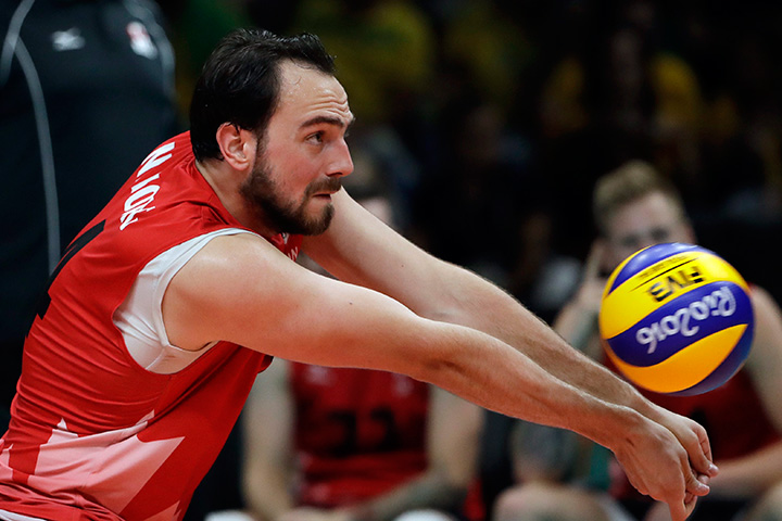 Canada’s Nicholas Hoag passes the ball during a men’s preliminary volleyball match against Italy at the 2016 Summer Olympics in Rio de Janeiro, Brazil, Monday, Aug. 15, 2016.