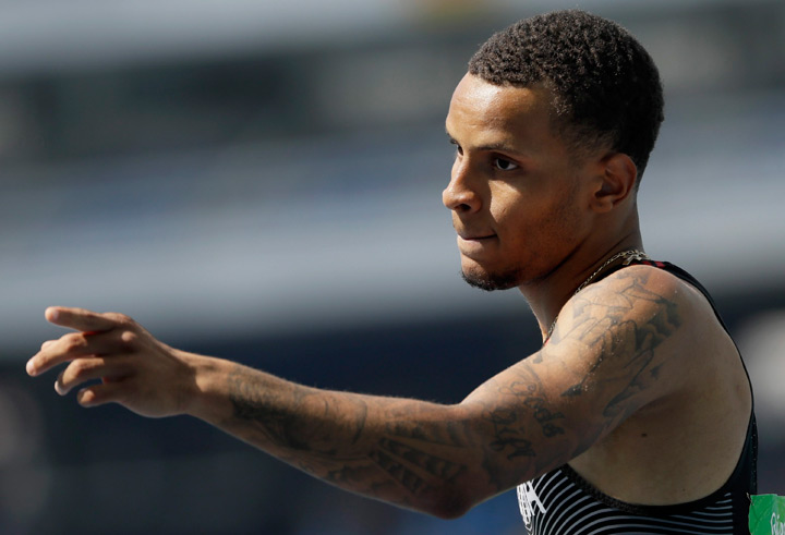 Canada's Andre De Grasse competes in a men's 200-meter heat