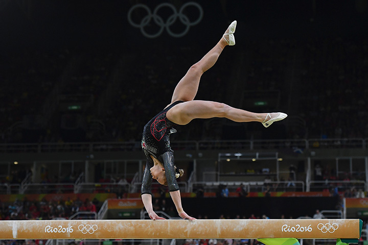 Canada's Ellie Black competes in the beam event of the women's individual all-around final of the Artistic Gymnastics at the Olympic Arena during the Rio 2016 Olympic Games in Rio de Janeiro on August 11, 2016. 