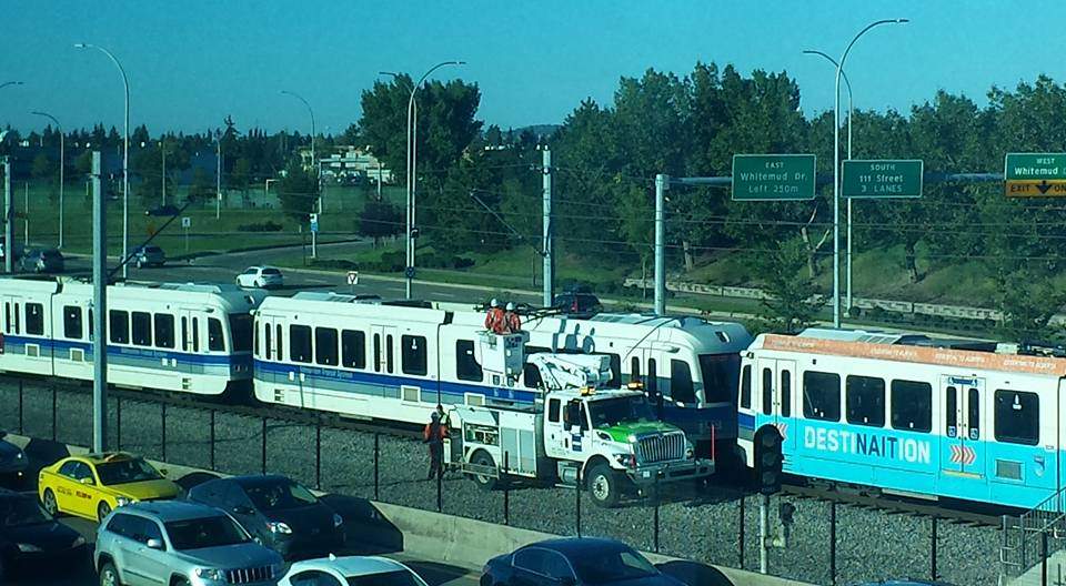 EPCOR crews fixing a power problem on the Edmonton transit LRT line near Southgate station. August 24, 2016.