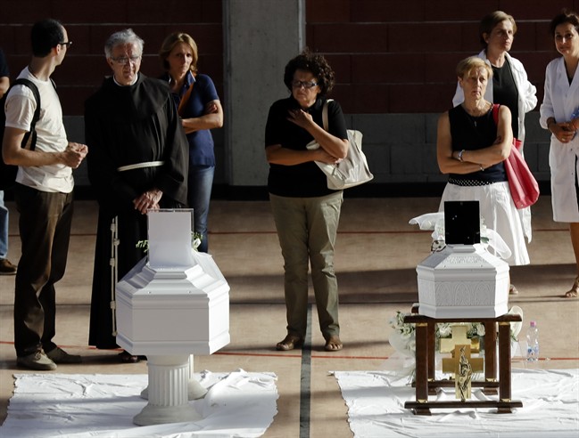 Coffins of some of the victims of Wednesday’s earthquake lie inside a gymnasium in Ascoli Piceno, Italy, Friday, Aug. 26, 2016.