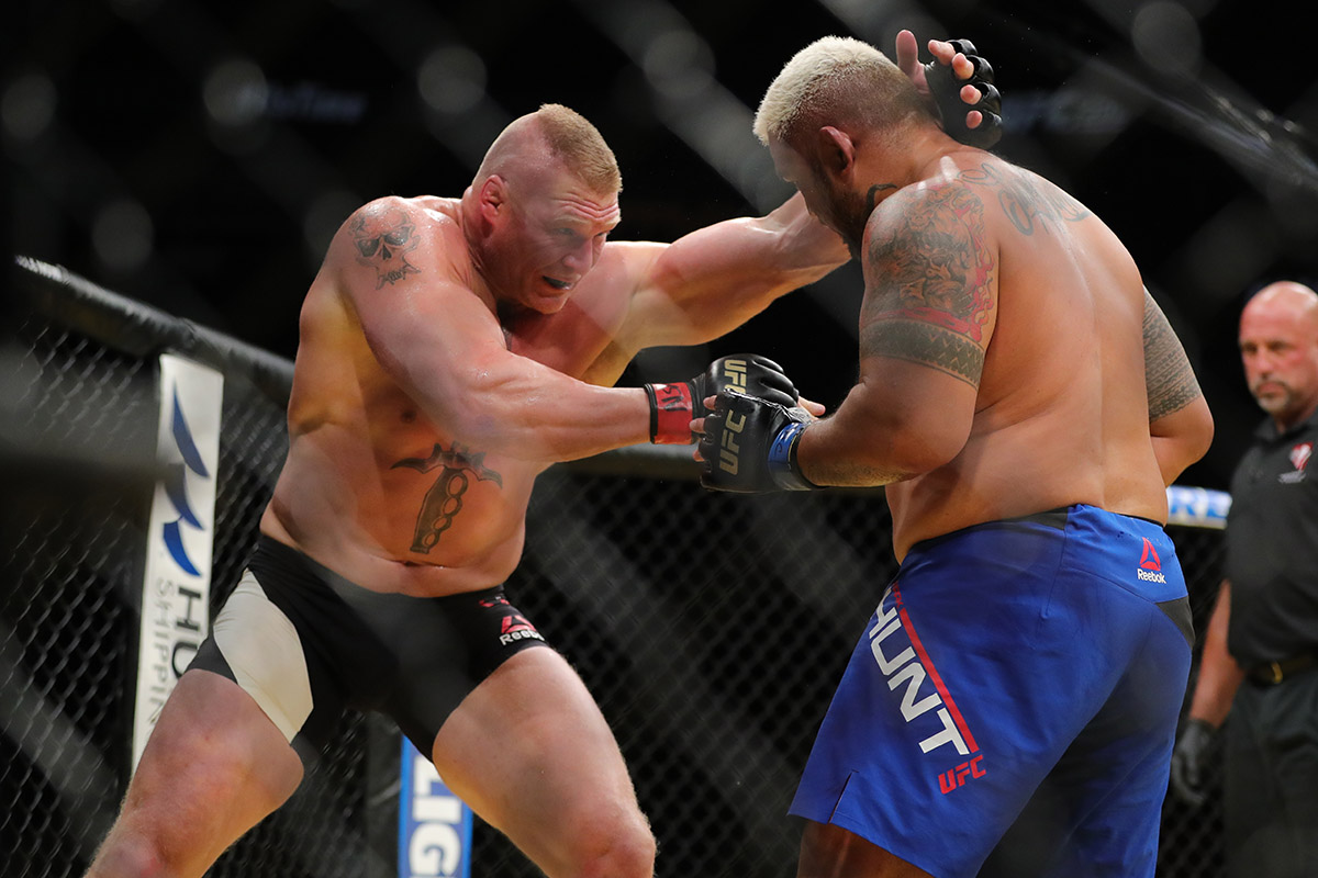  Brock Lesnar looks to take down Mark Hunt during the UFC 200 event at T-Mobile Arena on July 9, 2016 in Las Vegas, Nevada.