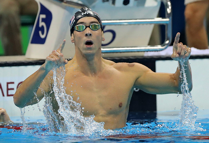 Michael Phelps celebrates winning the gold medal in the men's 200m butterfly during the swimming competitions at the 2016 Summer Olympics, Tuesday, Aug. 9, 2016, in Rio de Janeiro, Brazil. 