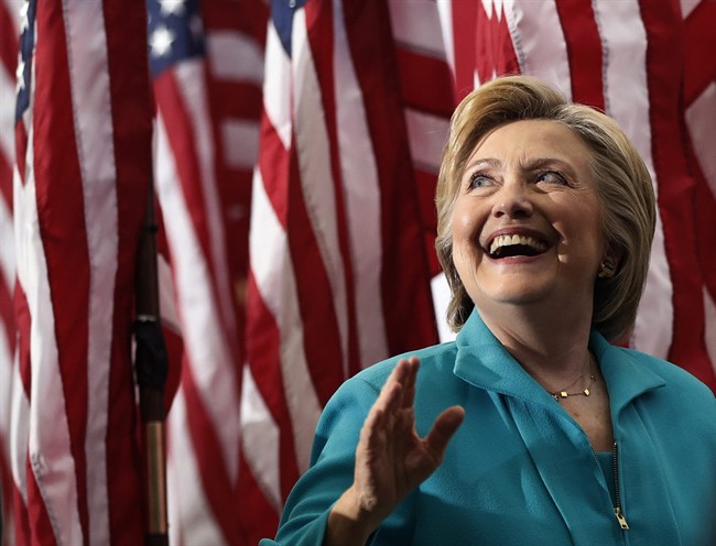 Democratic presidential candidate Hillary Clinton looks up to audience members as she leaves a campaign event at Truckee Meadows Community College in Reno, Nev., Thursday, Aug. 25, 2016. 