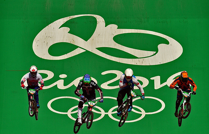Athletes train before the BMX cycling seeding run at the X-Park BMX venue in Deodoro during the Rio 2016 Olympic Games in Rio de Janeiro on August 17, 2016.