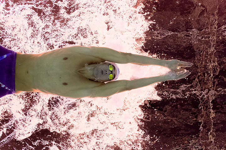 Michael Phelps competes in a men’s 200m individual medley heat at the Rio 2016 Olympic Games at the Olympic Aquatics Stadium on August 10, 2016.