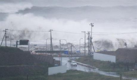 Waves crash against a coast in Ishinomaki, Miyagi prefecture, northeastern Japan, Tuesday, Aug. 30, 2016. A typhoon is about to barrel into northern Japan, threatening to bring floods to an area still recovering from the 2011 tsunami. Typhoon Lionrock has already paralyzed traffic, caused blackouts and prompted officials to urge residents to evacuate.