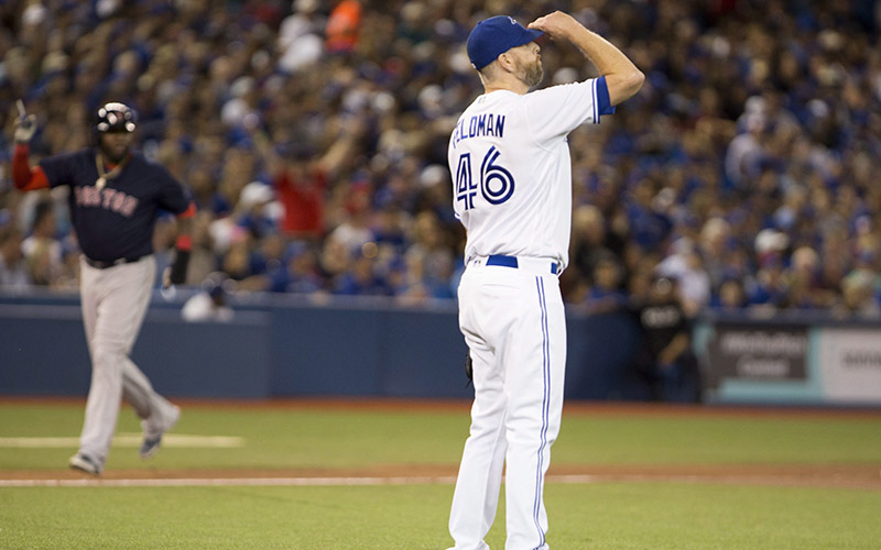 Toronto Blue Jays relief pitcher Scott Feldman reacts to a three-run homerun off the bat of Boston Red Sox first baseman Hanley Ramirez during seventh inning American League MLB baseball action in Toronto on Friday, September 9, 2016. 
