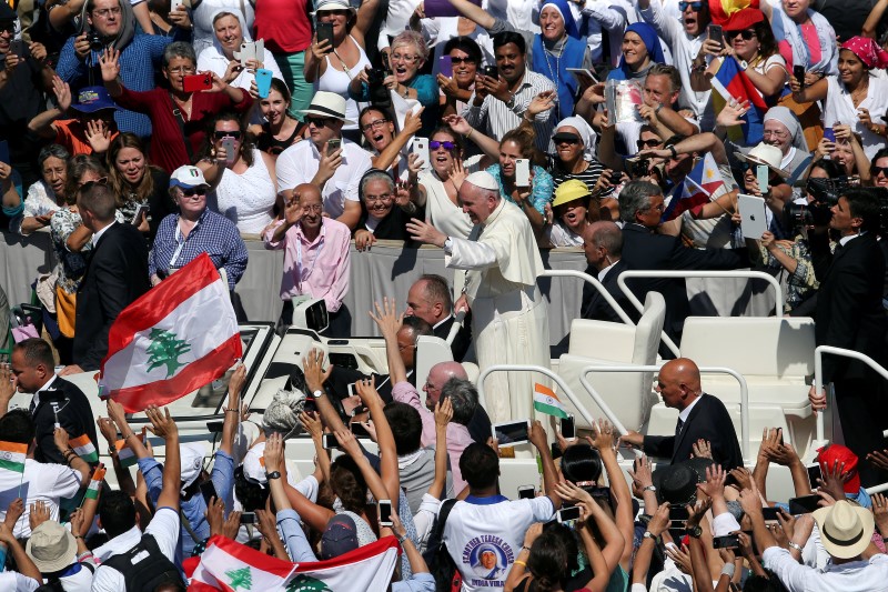 Pope Francis waves as he leaves at the end of a mass for the canonisation of Mother Teresa of Calcutta in Saint Peter’s Square at the Vatican September 4, 2016.