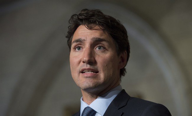 Canadian Prime Minister Justin Trudeau responds to a question on Parliament Hill in Ottawa, Tuesday September 13, 2016.