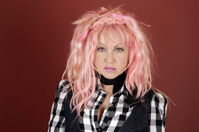 In this March 14, 2016, photo, Cyndi Lauper poses in Nashville, Tenn., to promote her new country album, "Detour," releasing on Friday, May 6. Lauper has posted a message on her Facebook page voicing her opposition to Montreal's newly adopted breed-specific legislation. Thursday, Sept. 29, 2016.