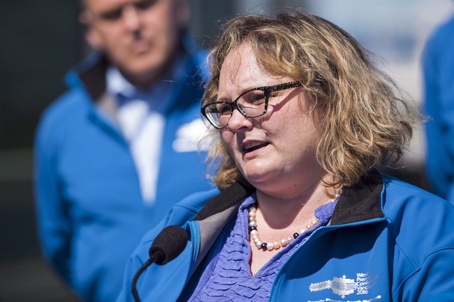 Alberta Deputy Premier Sarah Hoffman speaks with media. THE CANADIAN PRESS/Jimmy Jeong.