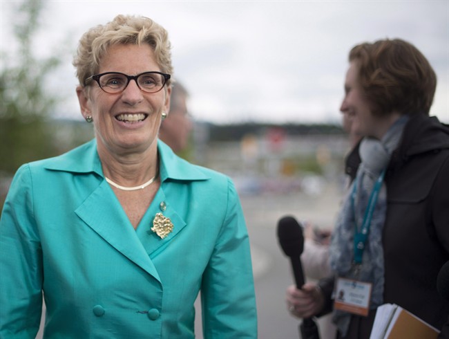 Premier Kathleen Wynne arrives for a meeting of Premiers in Whitehorse, Yukon, Friday, July, 22, 2016.