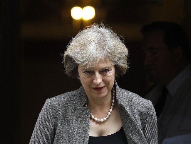 Britain's Prime Minister Theresa May leaves 10 Downing Street in London, Monday, Sept. 26, 2016. (AP Photo/Frank Augstein).