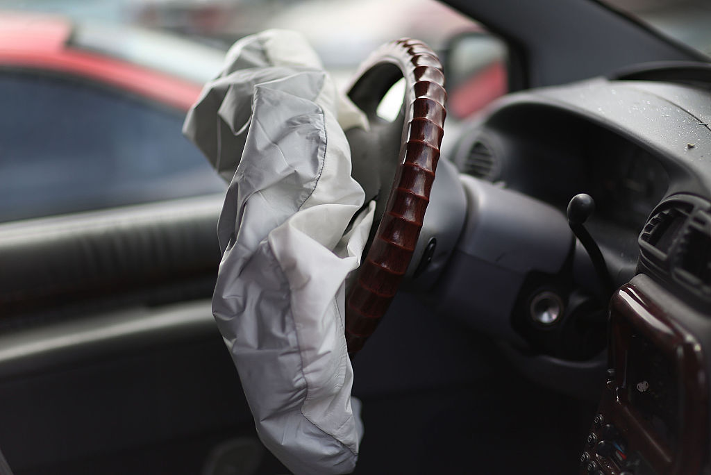 Dog critically hurt after airbags deploy in crash - image