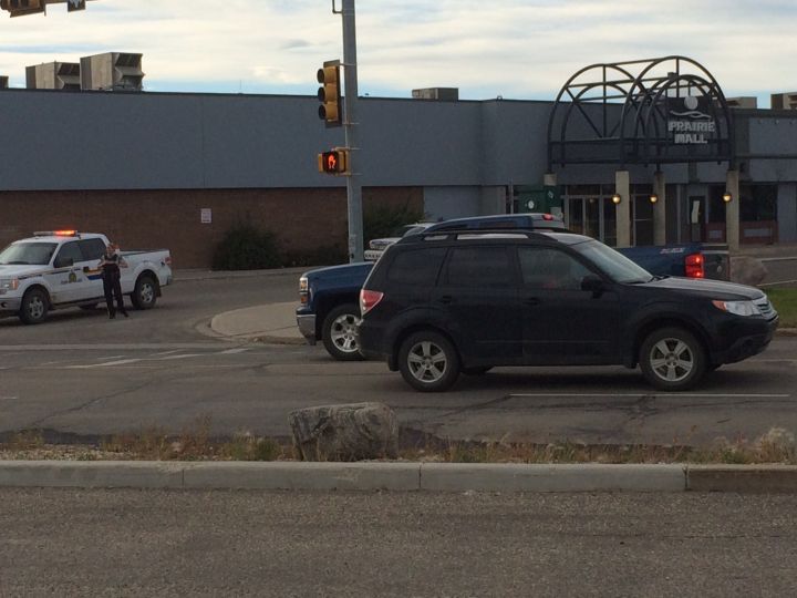 An RCMP presence is seen outside the Prairie Mall in Grande Prairie, Alta. The shopping centre was evacuated Thursday because of an “incident” according to a mall representative.