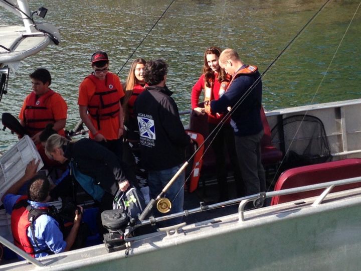 The Duke and Duchess of Cambridge putting life jackets on for a fishing trip from Haida Gwaii on Day 7 of the Royal Visit to Canada, Sept. 30, 2016.