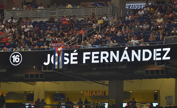 A Cuban flag hangs over the video board honouring Miami Marlins starting pitcher Jose Fernandez at Marlins Park.