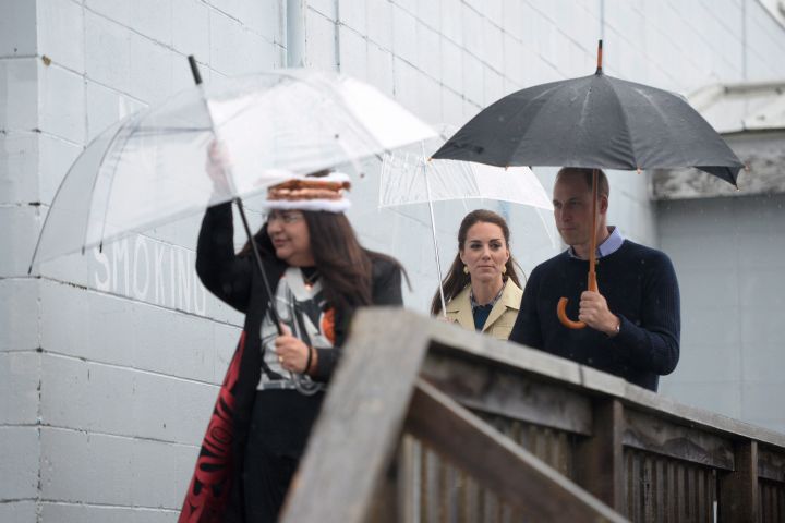 Will and Kate bring out the umbrellas for the wet, rainy weather Sept. 26, 2016 as their royal visit to Canada continues.