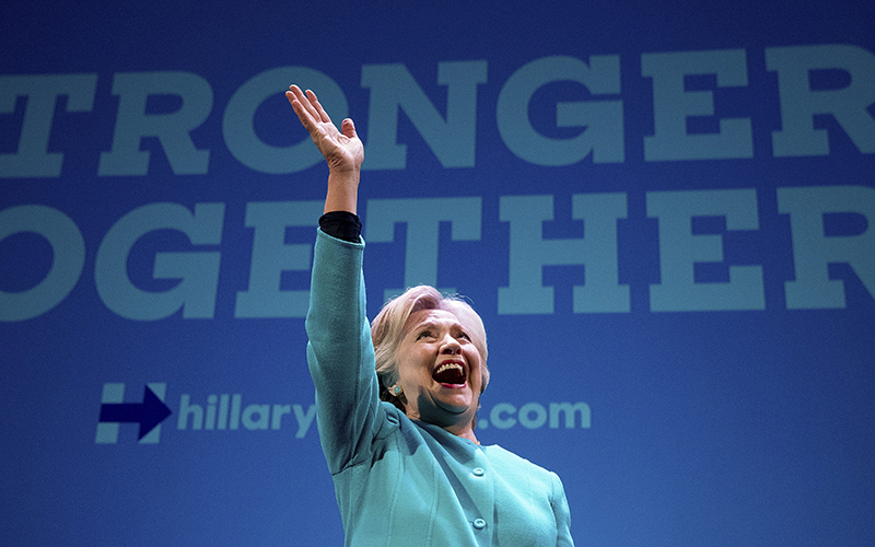 Democratic presidential candidate Hillary Clinton waves as she takes the stage to speak at a fundraiser at the Paramount Theatre in Seattle, Friday, Oct. 14, 2016. 