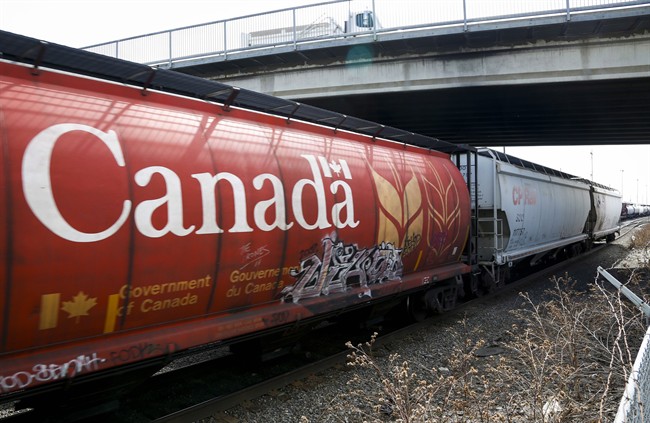 A Canadian Pacific Rail train hauling grain passes through Calgary, Thursday, May 1, 2014. The second largest crop on record is expected this year and farmers are worried about a repeat of a rail bottleneck that occurred in 2013-2014.