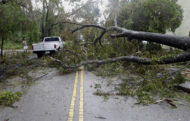 A truck negotiates around trees downed by Hurricane Matthew, Friday, Oct. 7, 2016, in Daytona Beach, Fla. Hurricane Matthew spared Florida‚Äôs most heavily populated stretch from a catastrophic blow Friday but threatened some of the South‚Äôs most historic and picturesque cities with ruinous flooding and wind damage as it pushed its way up the coastline. 