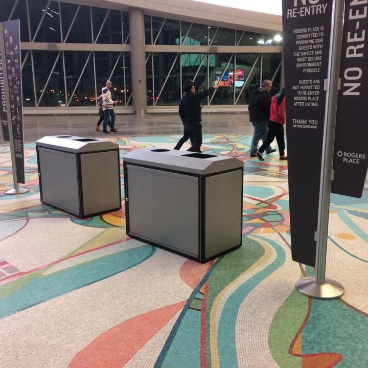 Rogers Place said it vows it will never again place garbage cans on the Iron Foot Place tile mosaic in Ford Hall after pictures of the arena doing just that caused public outcry on social media Wednesday, Oct. 12, 2016.
