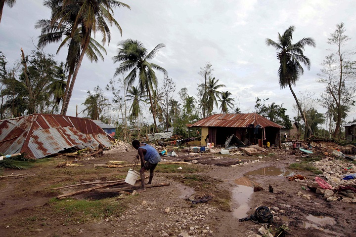 A man gets water from a well in an area destroyed by Hurricane Matthew in Cavaillon, Haiti, October 6, 2016. REUTERS/Andres Martinez Casares