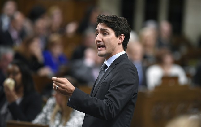 Prime Minister Justin Trudeau rises during Question Period on Monday, Oct. 17, 2016.