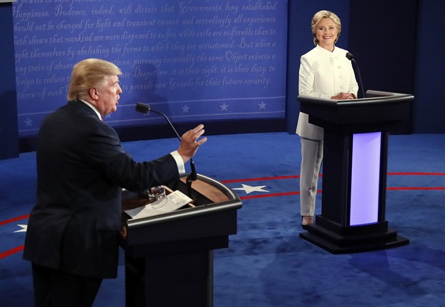 Republican presidential nominee Donald Trump debates Democratic presidential nominee Hillary Clinton during the third presidential debate at UNLV in Las Vegas, Wednesday, Oct. 19, 2016. (Mark Ralston/Pool via AP).