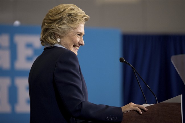 Democratic presidential candidate Hillary Clinton pauses as she speaks at a rally at the Downtown Toledo Train Station in Toledo, Ohio, Monday, Oct. 3, 2016. 