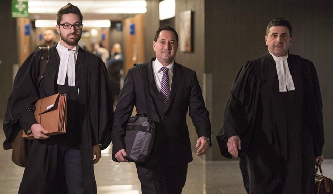 his lawyers, arrives at the courthouse, in Montreal in a November 14, 2016, file photo. 